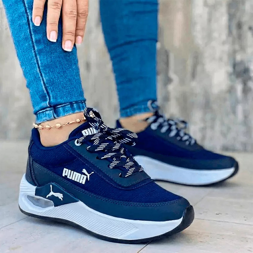 Zapatillas deportivas sport run azul marino para mujer y hombre con suela blanca y cámara de aire, calzado cómodo y casual.