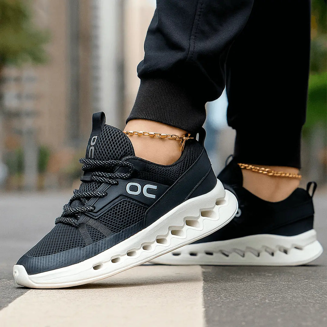 Zapatillas deportivas para mujer color gris con detalles lilas, diseño liviano y transpirable con suela amortiguadora para máximo confort en caminatas y ejercicios, ideales para uso urbano y estilo casual moderno en Colombia.