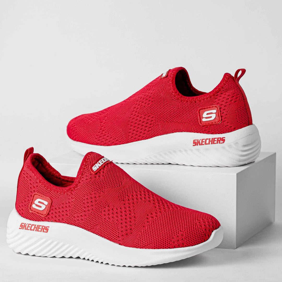 Zapatillas para mujer en color rojo con diseño deportivo y suela blanca antideslizante, zapatillas livianas y cómodas ideales para uso diario y actividades casuales, fabricadas con materiales transpirables y flexibles que ofrecen soporte y amortiguación para máximo confort durante todo el día.