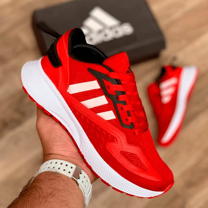 Tenis deportivos en color rojo intenso, perfectos para quienes buscan destacar con estilo y comodidad.