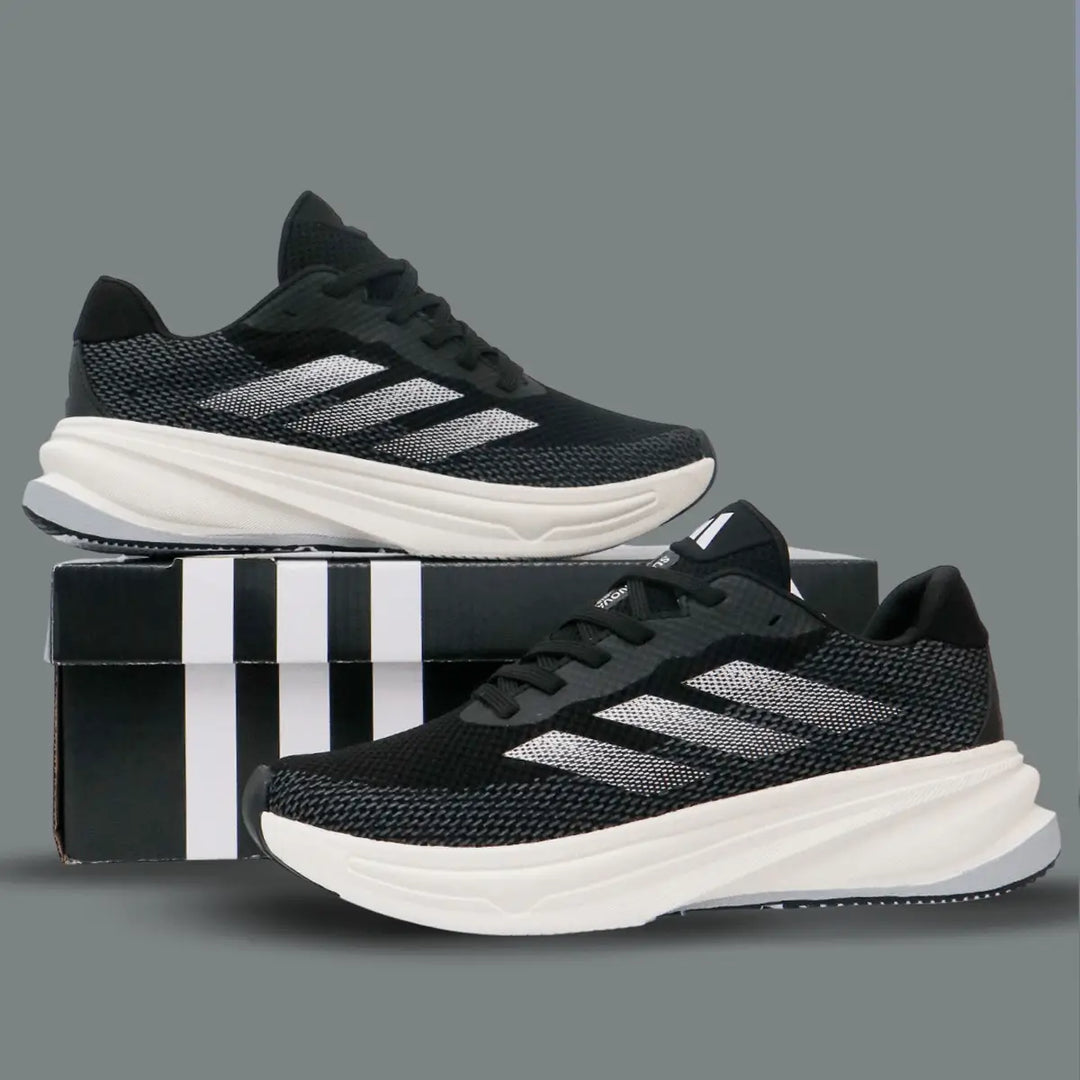 Zapatillas negras para correr con suela gruesa blanca, diseño moderno en tejido transpirable, ideales para deportes y uso diario, ofrecen comodidad, amortiguación avanzada y soporte para los pies, perfectas para mejorar el rendimiento y estilo urbano.